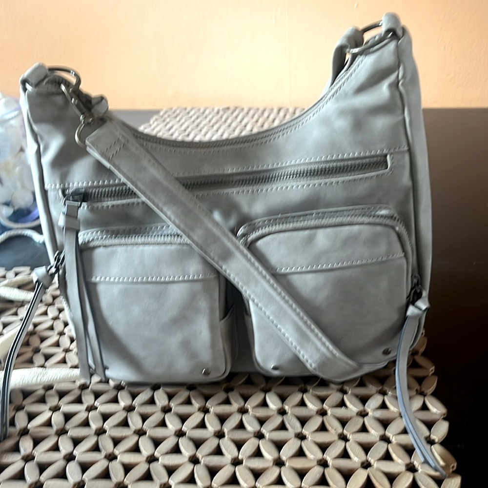 Baylee convertible multi pocket purse in taupe.